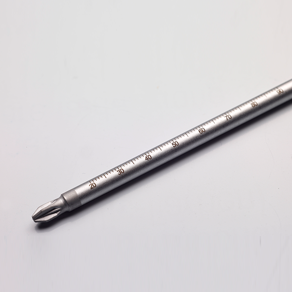 Metal drill bit with laser markings indicating measurements, showcasing precision for applications in manufacturing and medical tools.